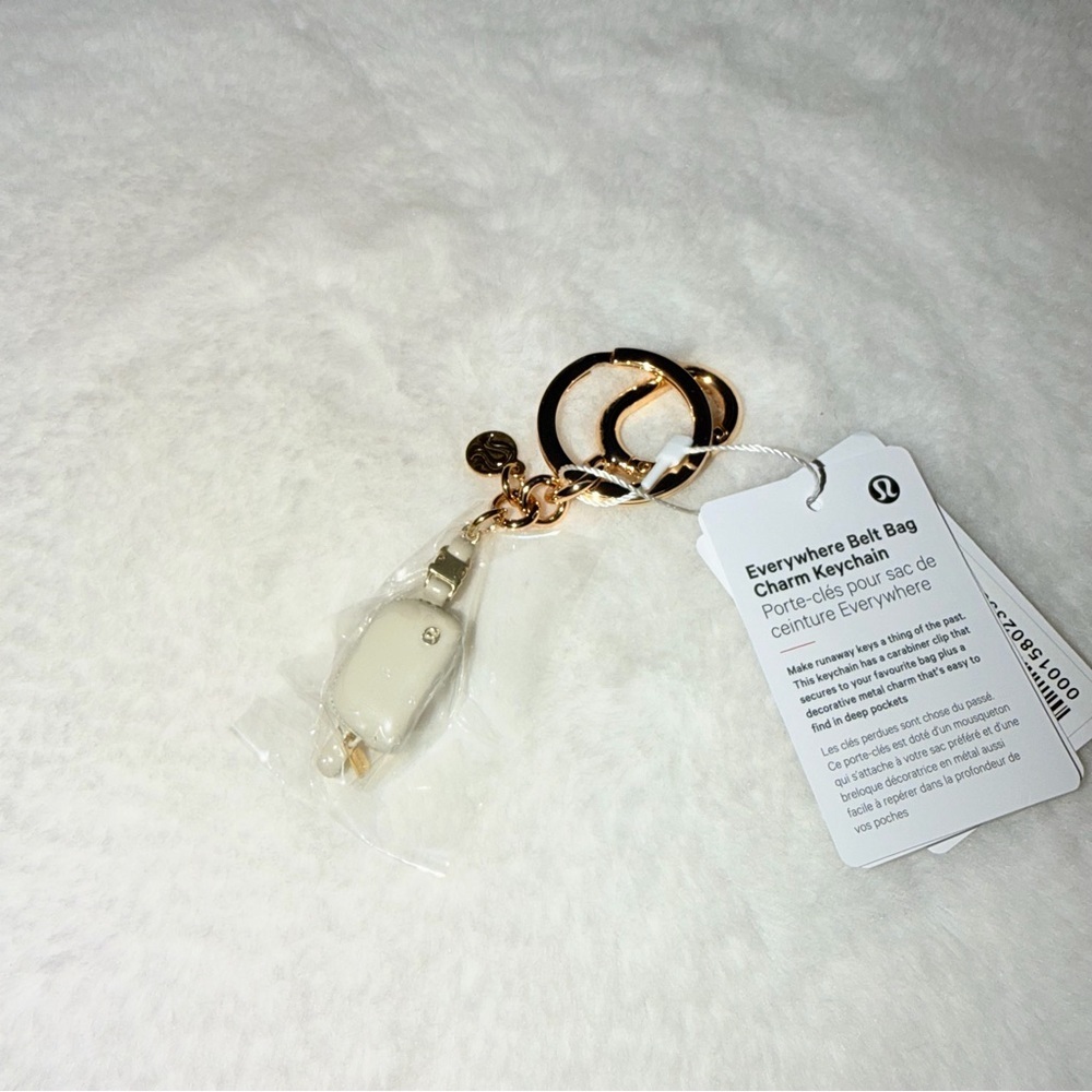 Lululemon Everywhere Belt Bag Charm Gold and Cream Keychain - Picture 2 of 5